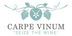 Logo featuring a stylized sand dollar with vine leaves and script, text reading CARPE VINUM 'SEIZE THE WINE'.