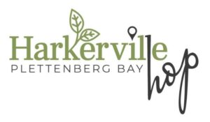 Logo for Harkerville Hop Plettenberg Bay featuring green text and leaf icon with a map pin marker.